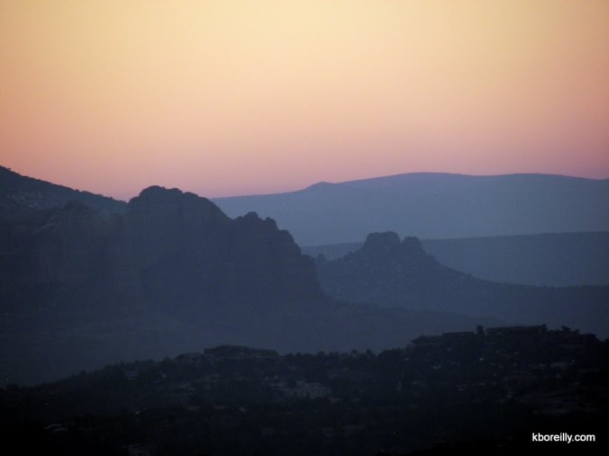 The sun rises over the red rocks of Sedona, Ariz.